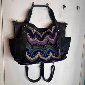 Leather the perfect bag convertible backpack hand woven huipil OOAK
